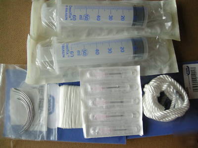 Lambing aid, suture tape, curved & hypodermic needles 