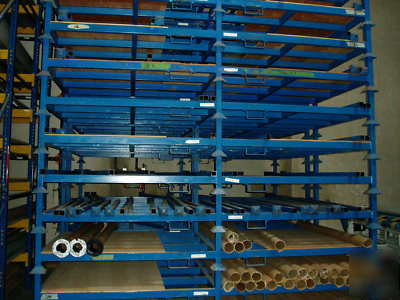 Lot of carpet padding racks warehouse stackable storage