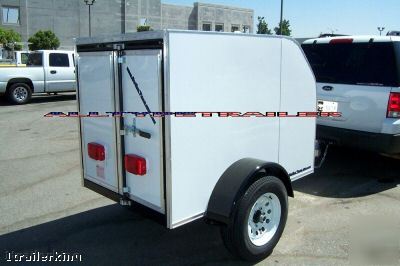 New 2009 model enclosed cargo box utility trailer