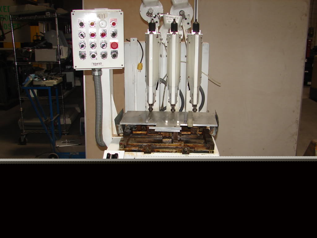 Milford multihead. 56 riviter automated assembly 9''