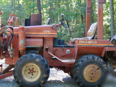 New 2310 ditch witch;A220 backhoe,6' boom, chain,teeth