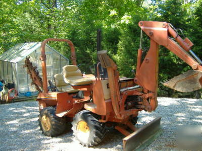 New 2310 ditch witch;A220 backhoe,6' boom, chain,teeth