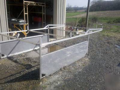 Custom aluminum ladder rack sysem for a dump truck