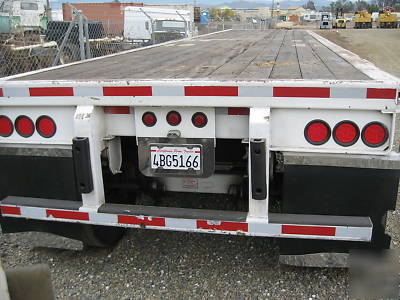 Trailmobile tandem axle flatbed trailer -- refurbished 