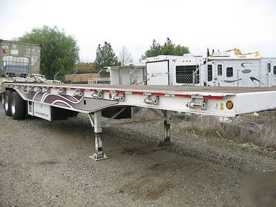 Trailmobile tandem axle flatbed trailer -- refurbished 