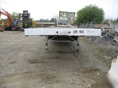 Trailmobile tandem axle flatbed trailer -- refurbished 