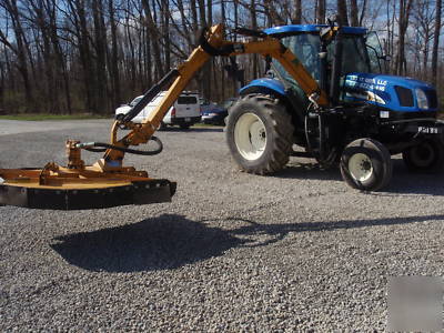 New 2004 holland TS100A 2303 hourswith alamo boom mower