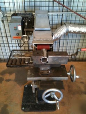 Abrasive belt notcher almi 100 b