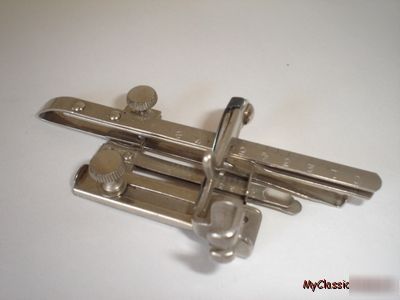 Singer featherweight 221 tucker foot attachment # 36583