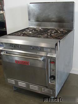 Vulcan four burner range with standard oven, nat gas