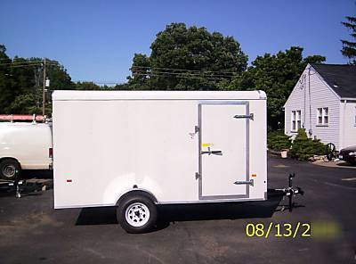 2010 6X12 haulin trailer side door, rear ramp, white