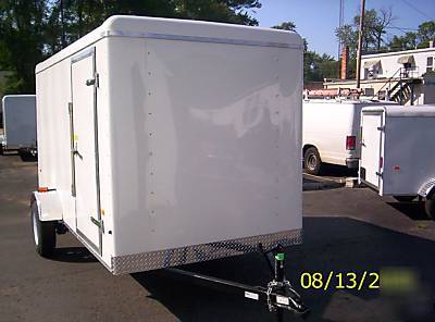 2010 6X12 haulin trailer side door, rear ramp, white