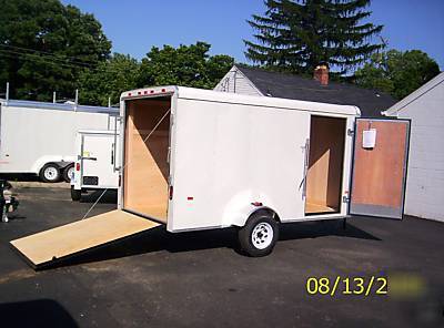 2010 6X12 haulin trailer side door, rear ramp, white