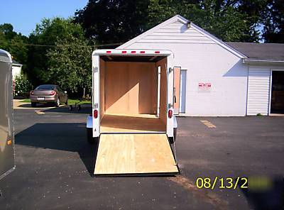 2010 6X12 haulin trailer side door, rear ramp, white