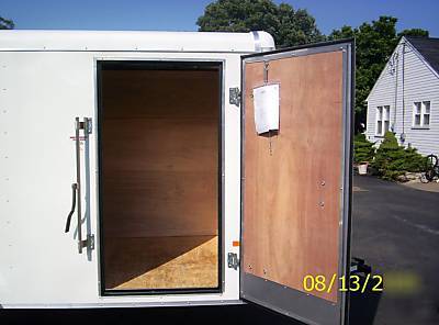 2010 6X12 haulin trailer side door, rear ramp, white