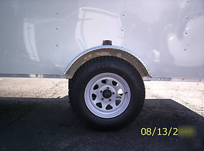 2010 6X12 haulin trailer side door, rear ramp, white