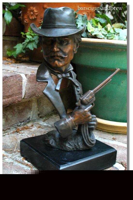 Sheriff cowboy bronze gun hat old cop police