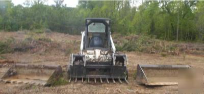 T-200 bobcat skid steer tracked with buckets