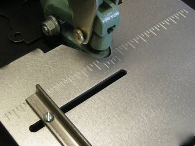 Sheet metal punch table with ruler